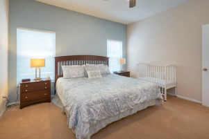 Master bedroom, with cot available for guests to use (this can be moved into any room)